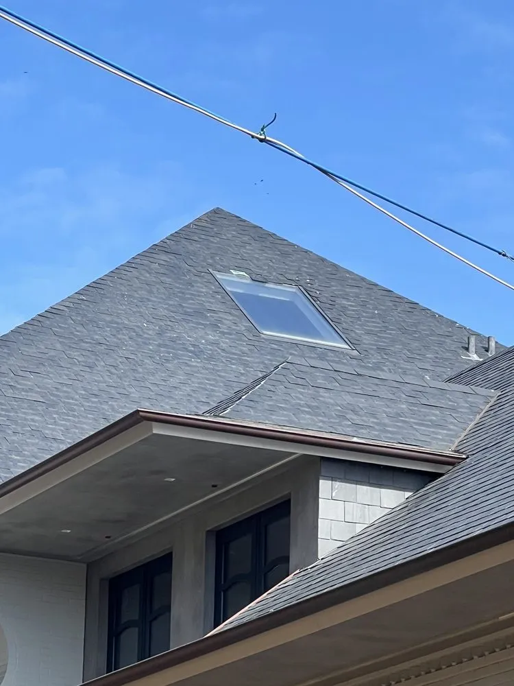 Slide of Clonts Roofing