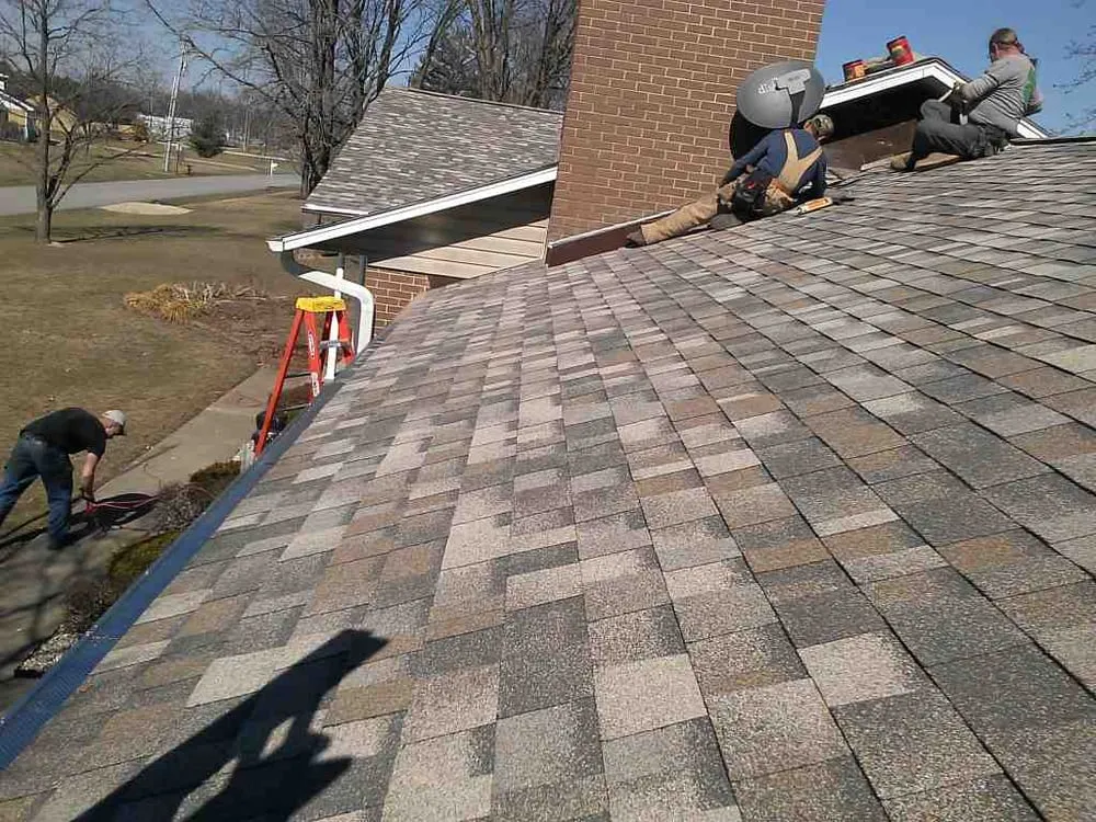 Slide of Clover Roofing