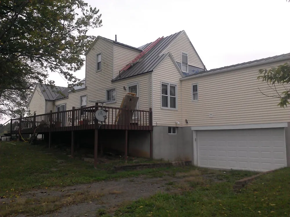 Slide of Clover Roofing