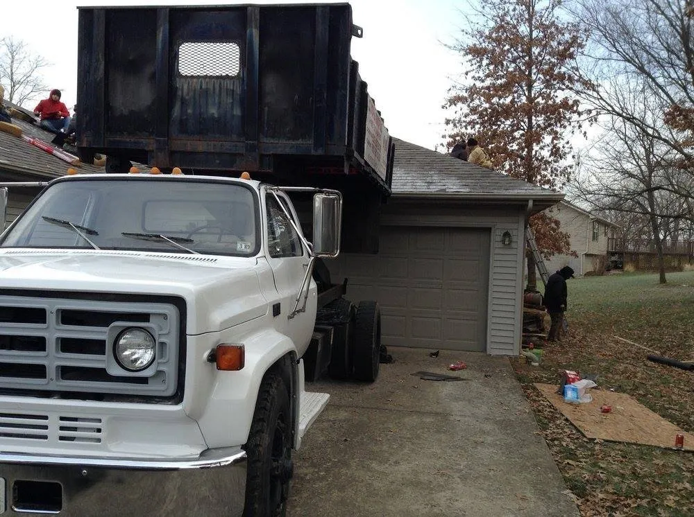 Slide of Clyde's Roofing