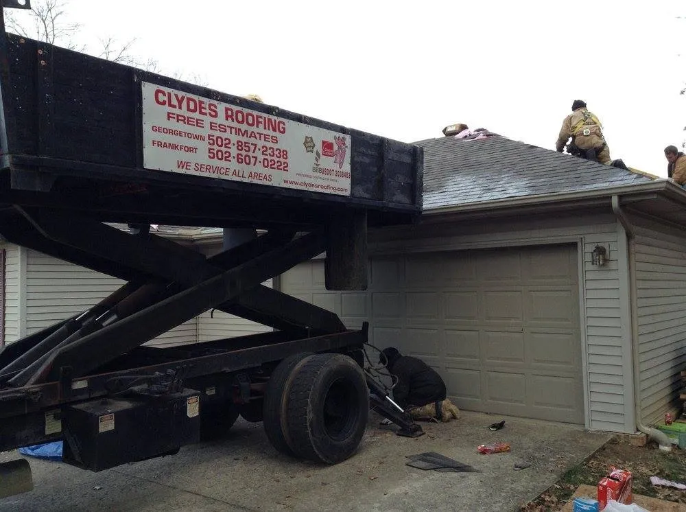 Slide of Clyde's Roofing