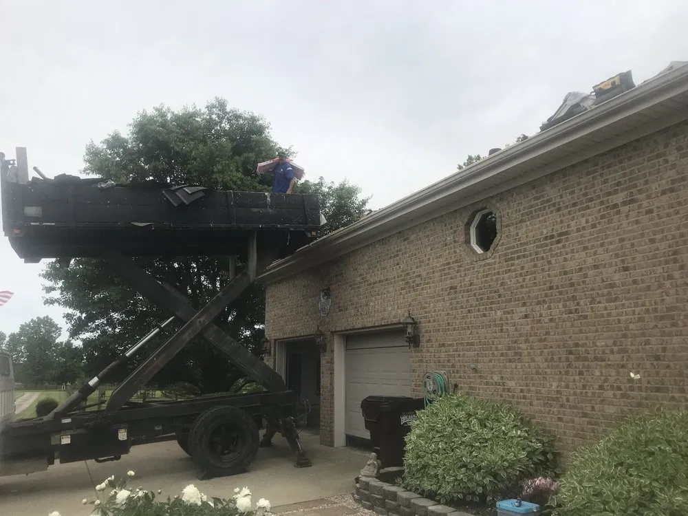 Slide of Clyde's Roofing