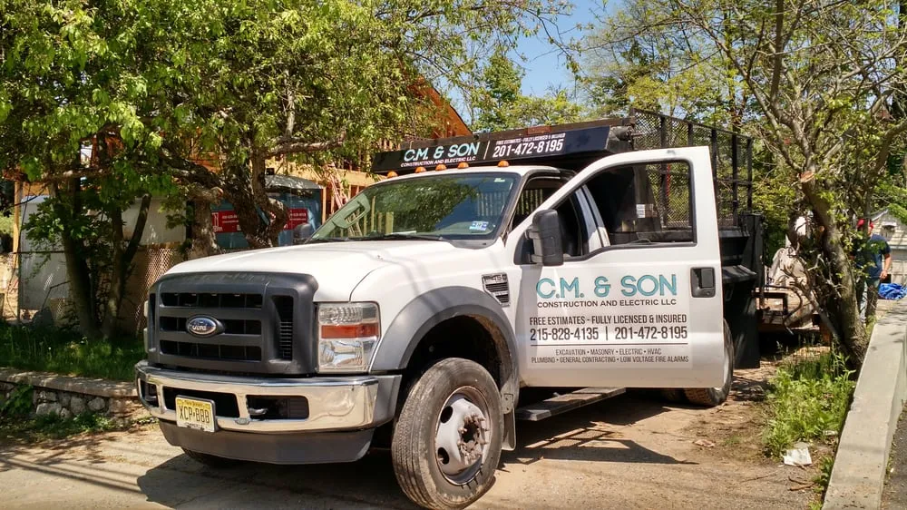 Slide of CM & Son Construction and Electric