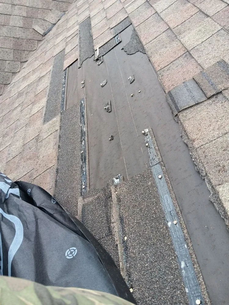 Slide of C&M Roofing