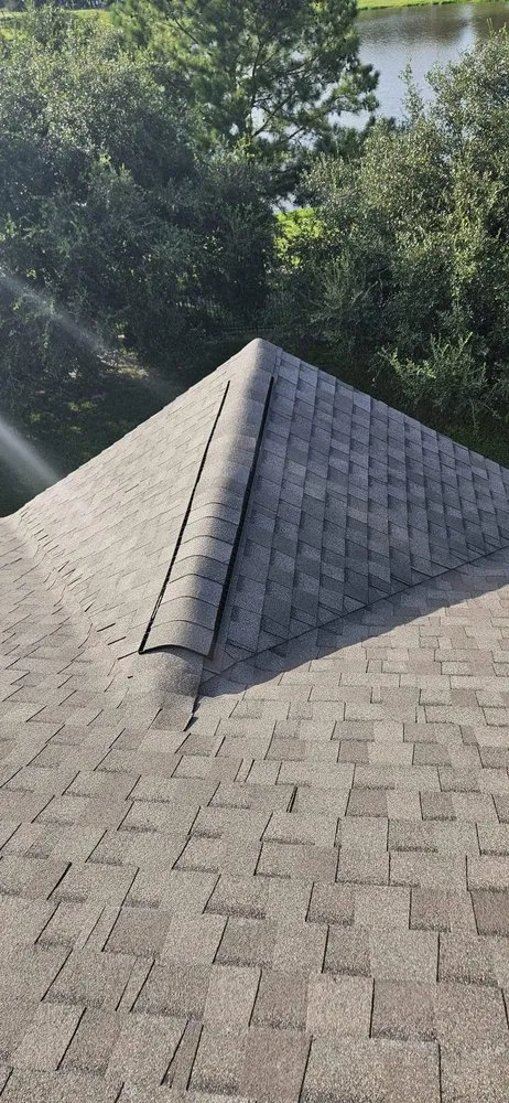 Slide of CM Roofing Pros