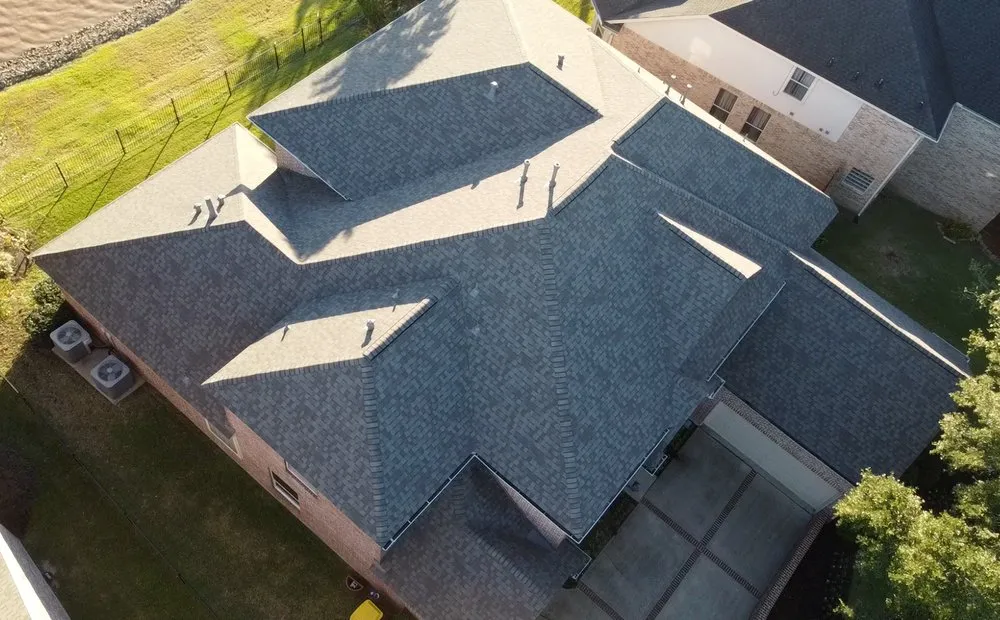 Slide of CM Roofing Pros