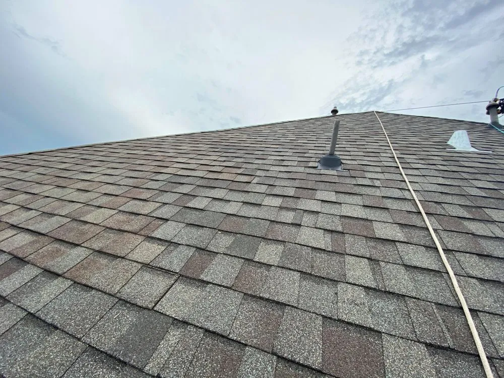 Slide of CM Roofing Pros