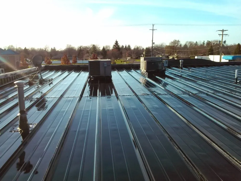 Slide of CM Roofing Services