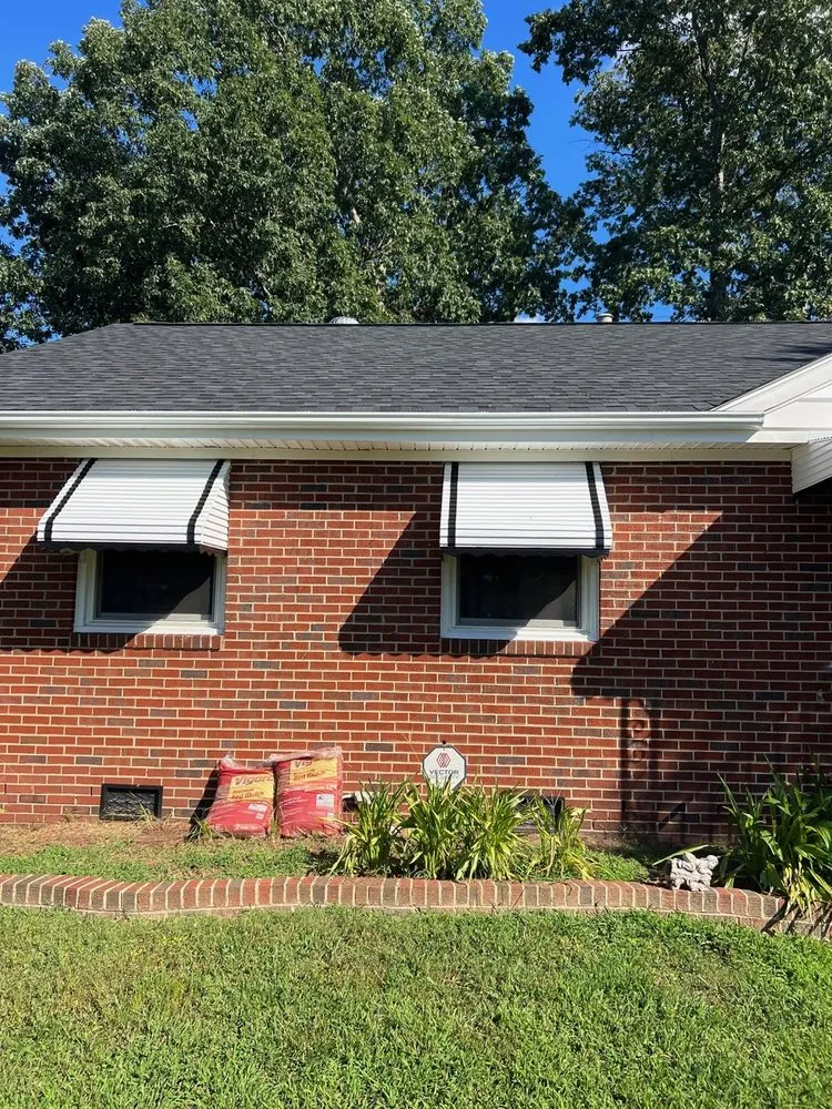 Slide of CMH Roofing