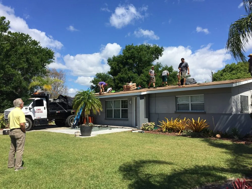 Slide of CMM Roofing