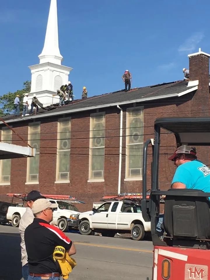 Slide of CMS Roofing & Restoration