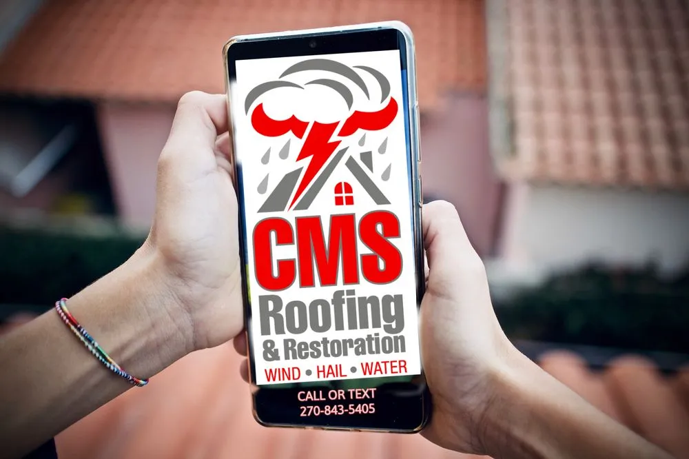 Slide of CMS Roofing & Restoration