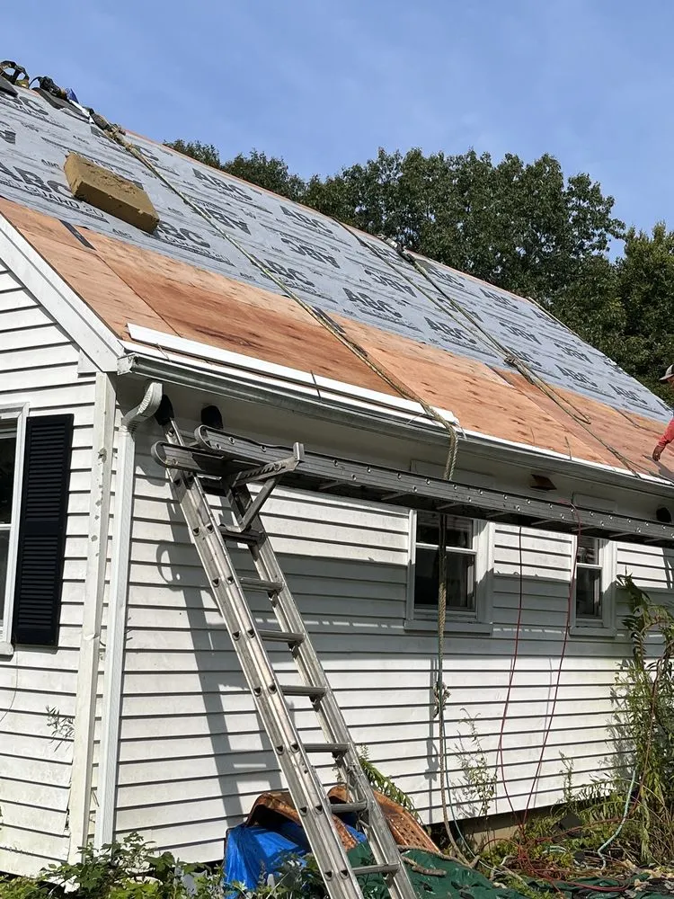 Slide of CMW Roofing & Siding