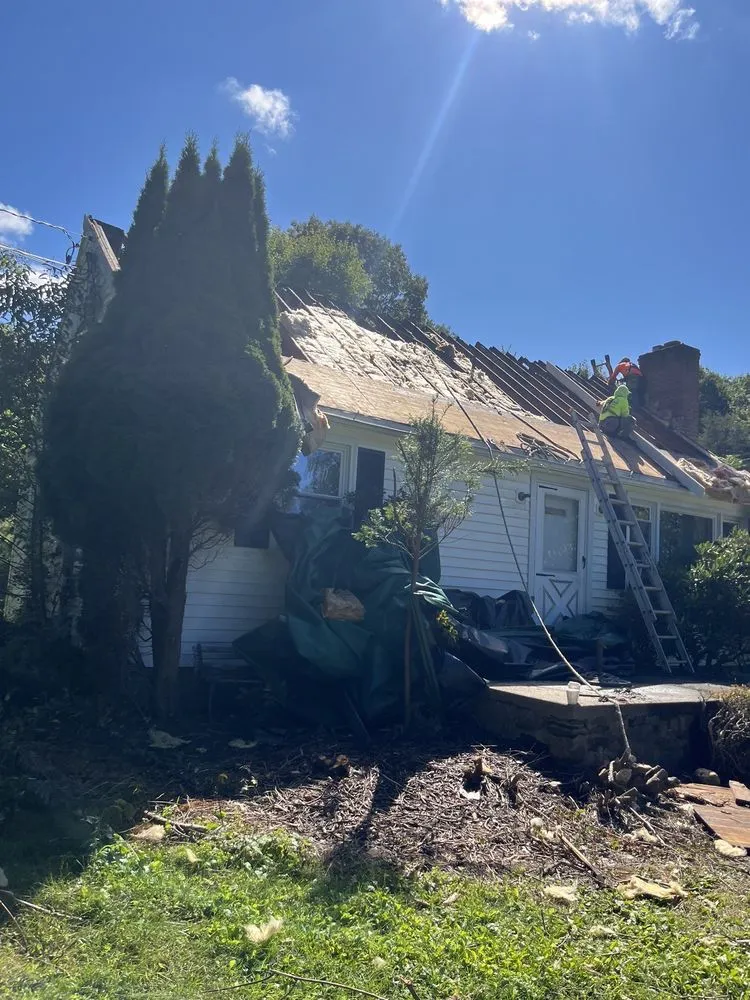 Slide of CMW Roofing & Siding