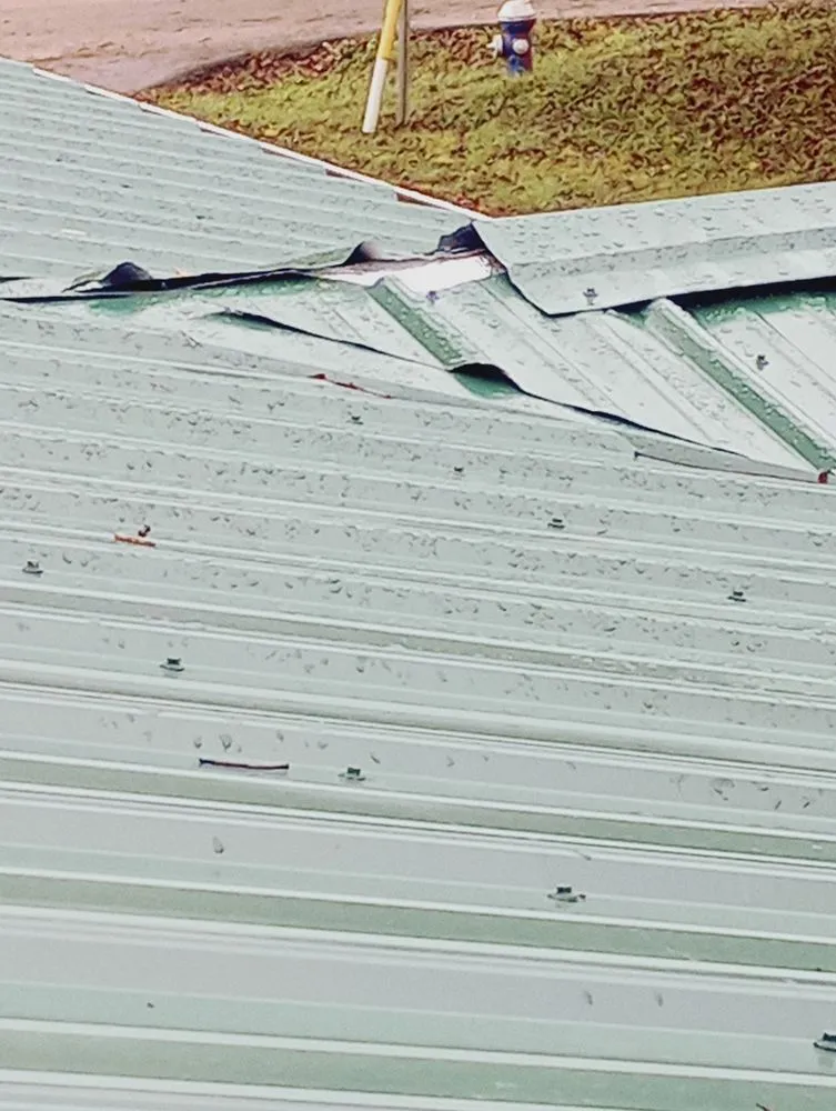 Slide of CNJS Roofing