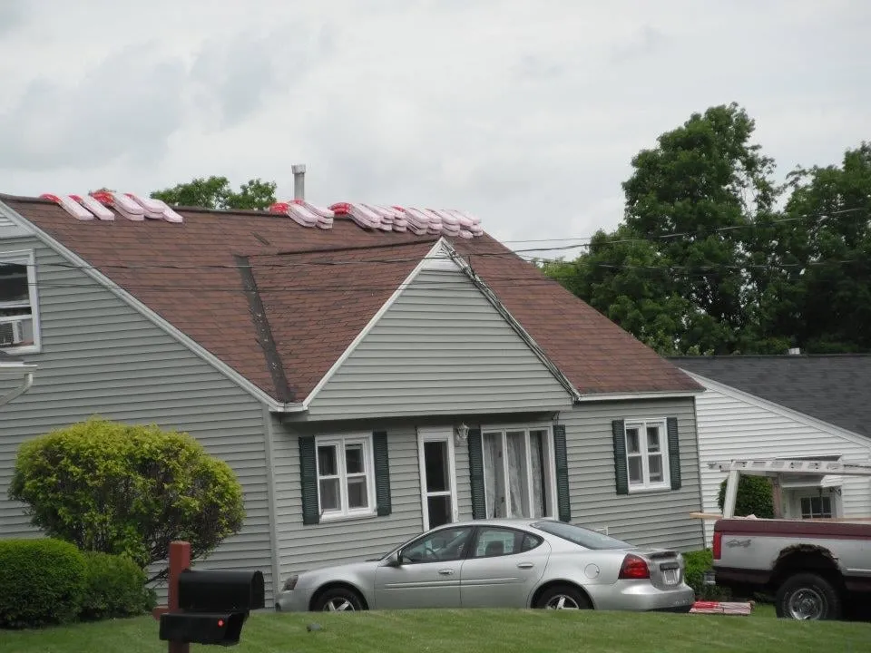 Slide of CNY Roofing