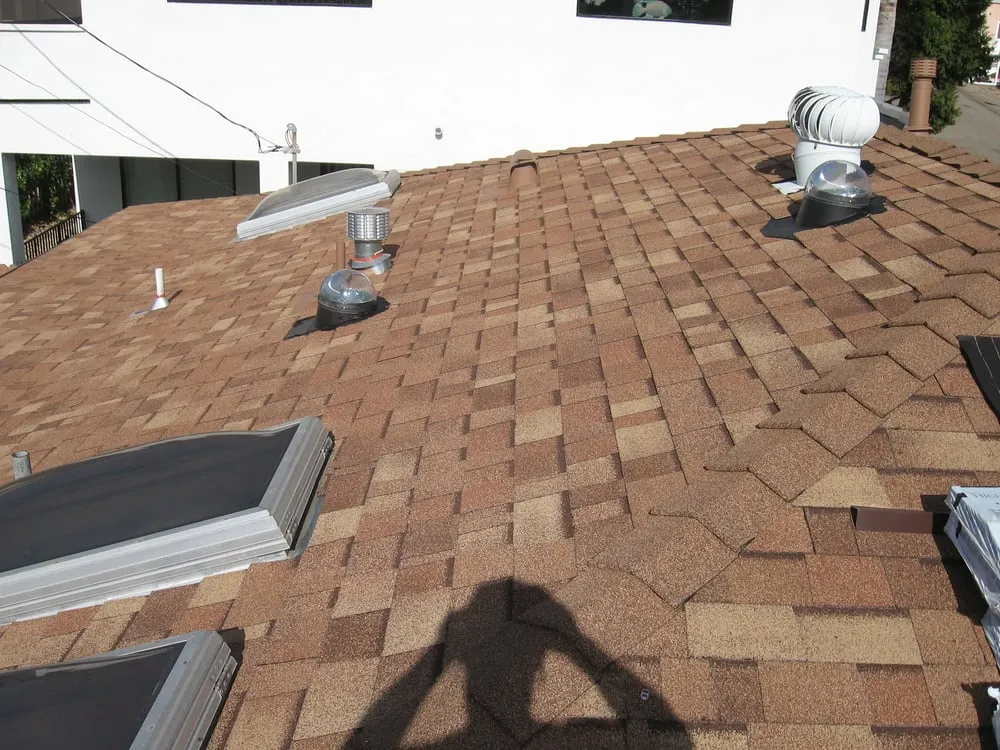 Slide of Coast Roofing