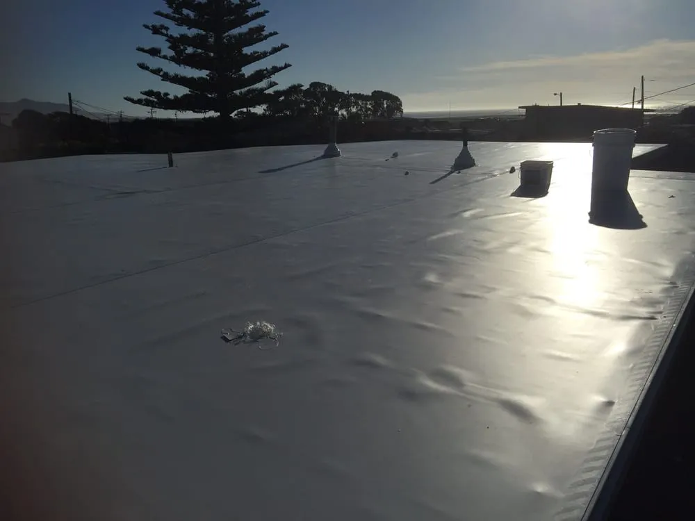 Slide of Coast Roofing