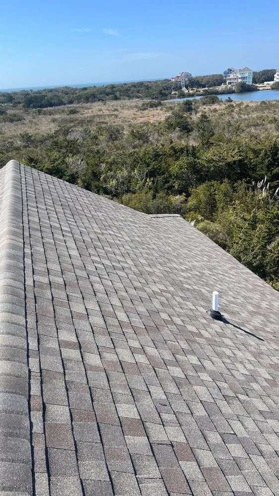 Local roof replacement after storm damage across Powells Point, NC - Coastal Roofing & Siding