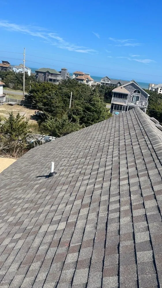 Licensed roof leak repair in Powells Point, NC by Coastal Roofing & Siding