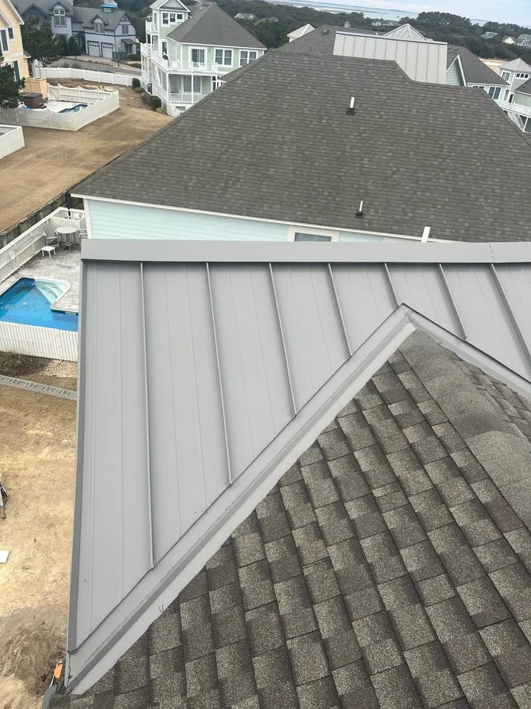 Professional residential roofing service in Powells Point, NC by Coastal Roofing & Siding