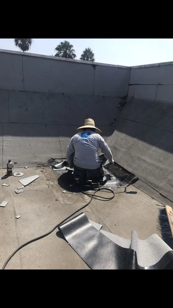 Slide of Coastal Roofing