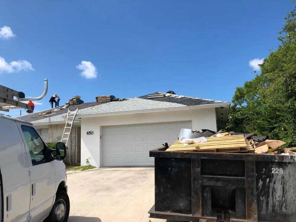 Slide of Coastal Roofing