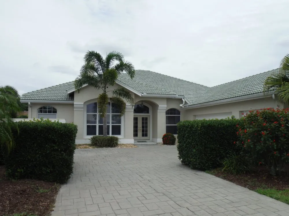 Slide of Coastal Roofing