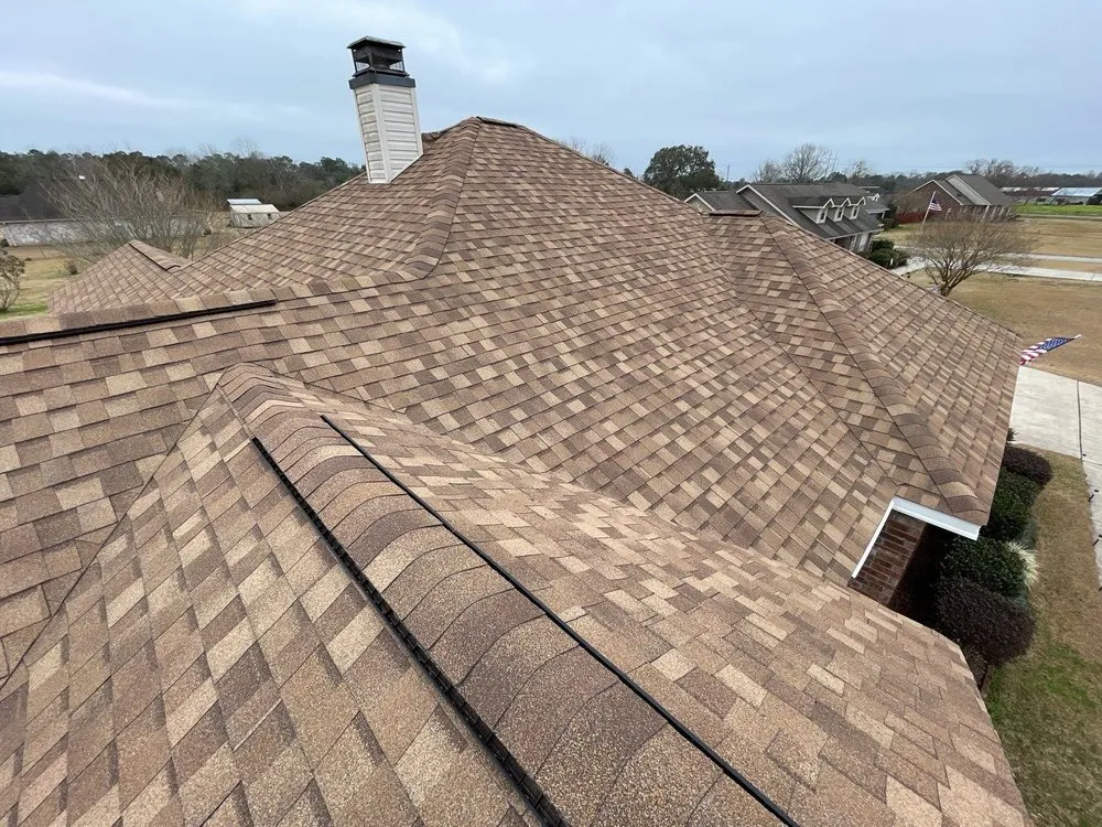 Slide of Coastal Roofing