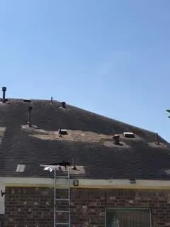 Slide of Coat of Arms Roofing