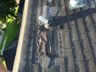 Slide of Coat of Arms Roofing