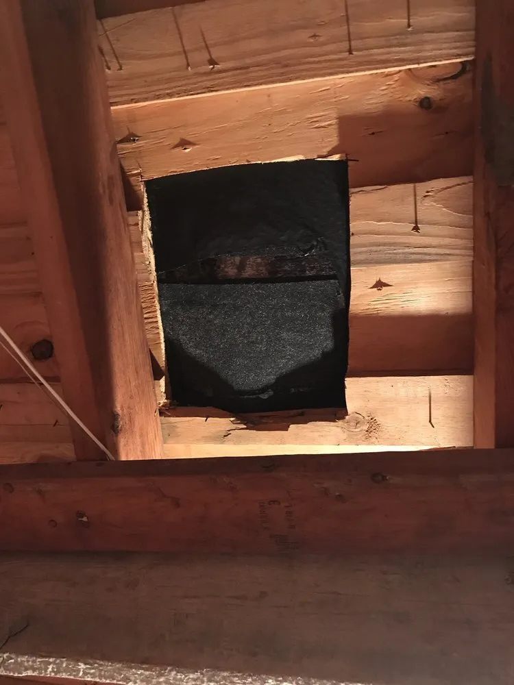 Slide of Coat of Arms Roofing