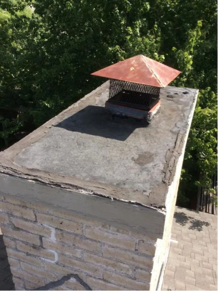 Slide of Coat of Arms Roofing