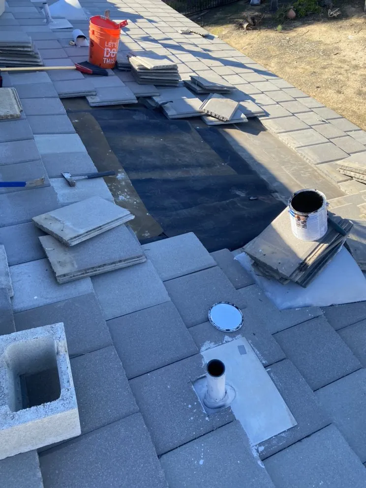 Slide of Coby Roof Repair