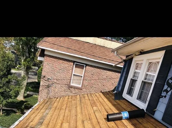 Slide of Codys Roofing