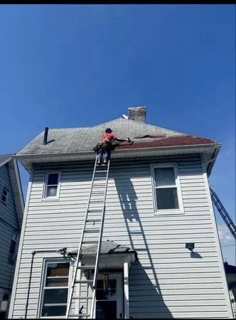 Slide of Codys Roofing