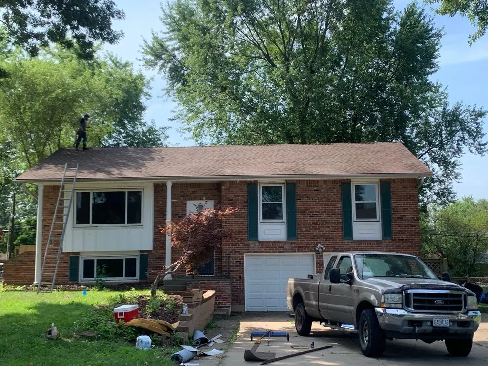 Slide of Collins Roofing