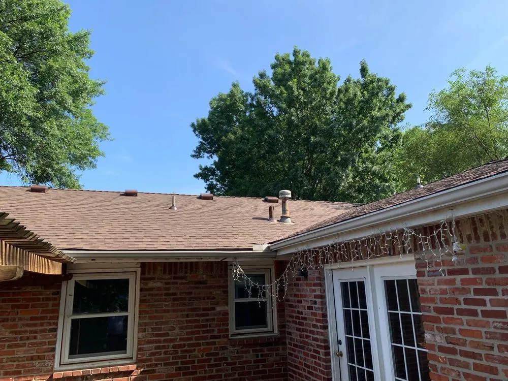 Slide of Collins Roofing