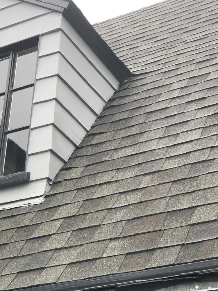 Slide of Collins Roofing