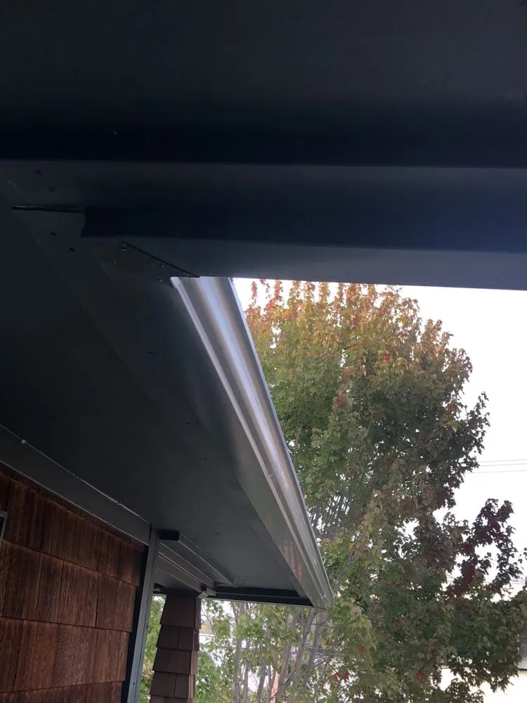 Slide of Collins Roofing