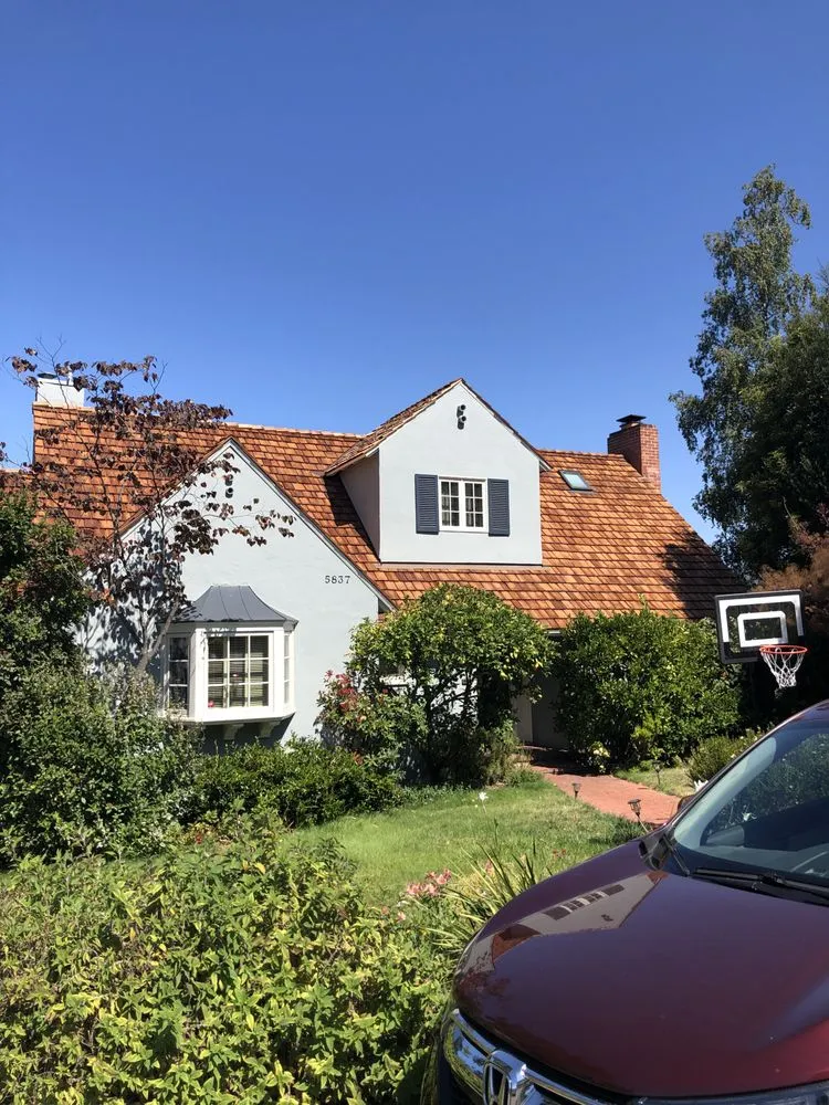 Slide of Collins Roofing