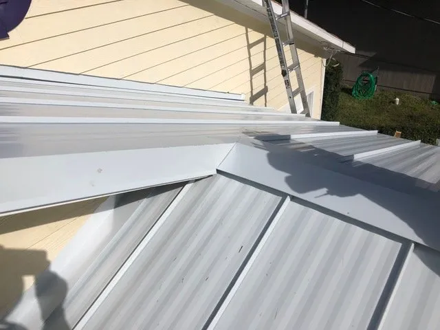 Slide of Collis Roofing