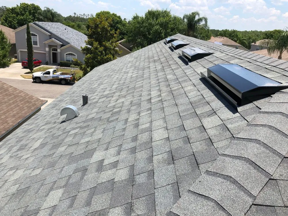 Slide of Collis Roofing