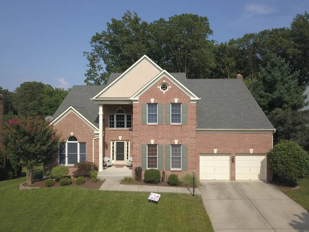 Slide of Colonial Roofing