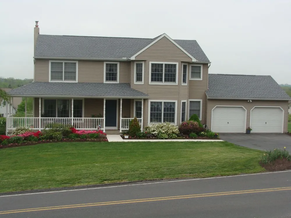 Slide of Colonial Roofing