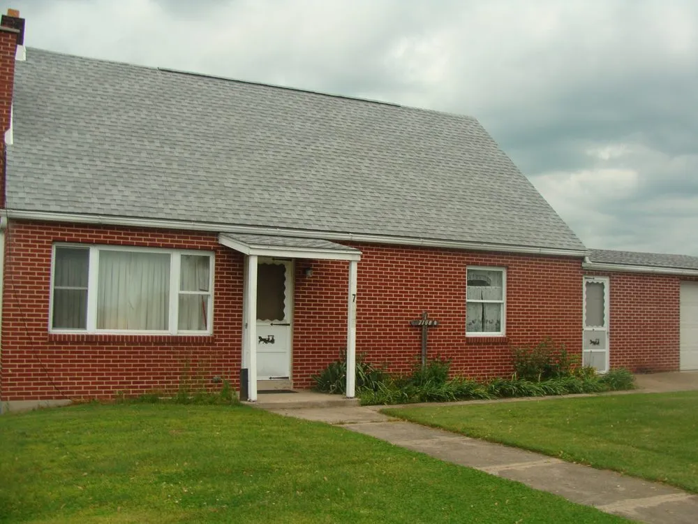 Slide of Colonial Roofing