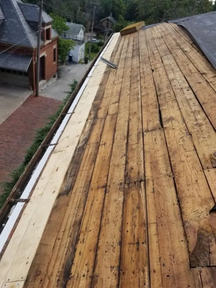 Slide of Colonial Roofing Systems