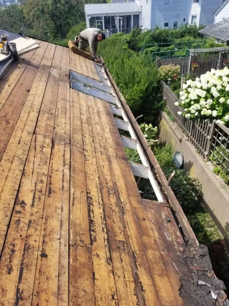 Slide of Colonial Roofing Systems