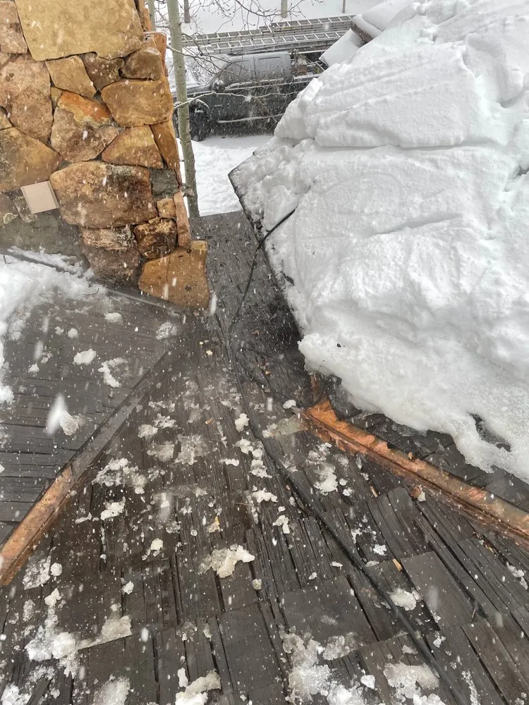 Slide of Colorado Ice Dam Removal