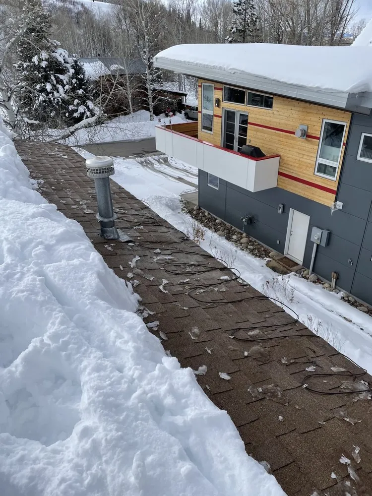 Slide of Colorado Ice Dam Removal